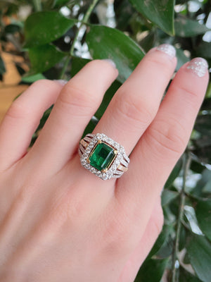 Diva Two Tone Emerald & Diamond Halo Ring