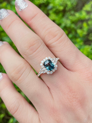 Peacock Teal Sapphire & Diamond Halo Ring