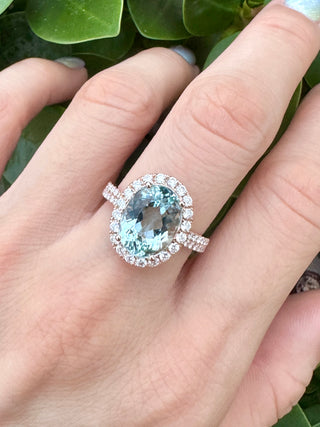 Oval Aquamarine & Micro Pave Diamond Halo Ring