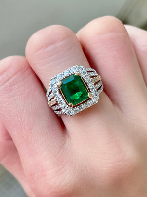 Diva Two Tone Emerald & Diamond Halo Ring
