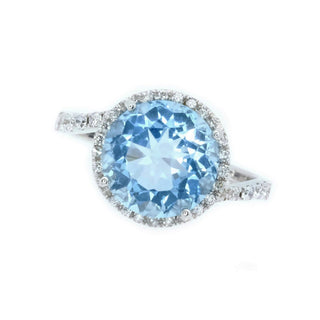 Sky Blue Topaz & Diamond Halo Ring