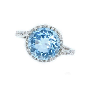 Sky Blue Topaz & Diamond Halo Ring