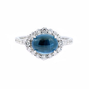 East-West Cabochon Sapphire & Diamond Halo Ring