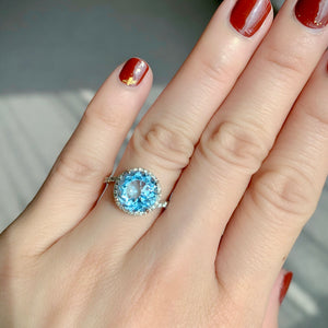 Sky Blue Topaz & Diamond Halo Ring
